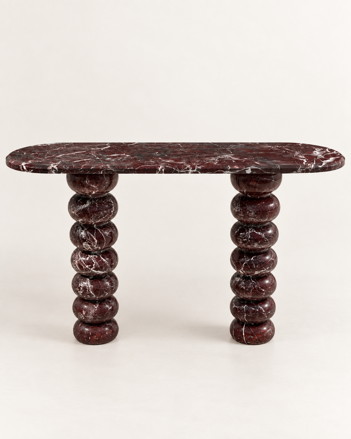 Rosso marmer console tafel met sculpturale bolvormige poten.